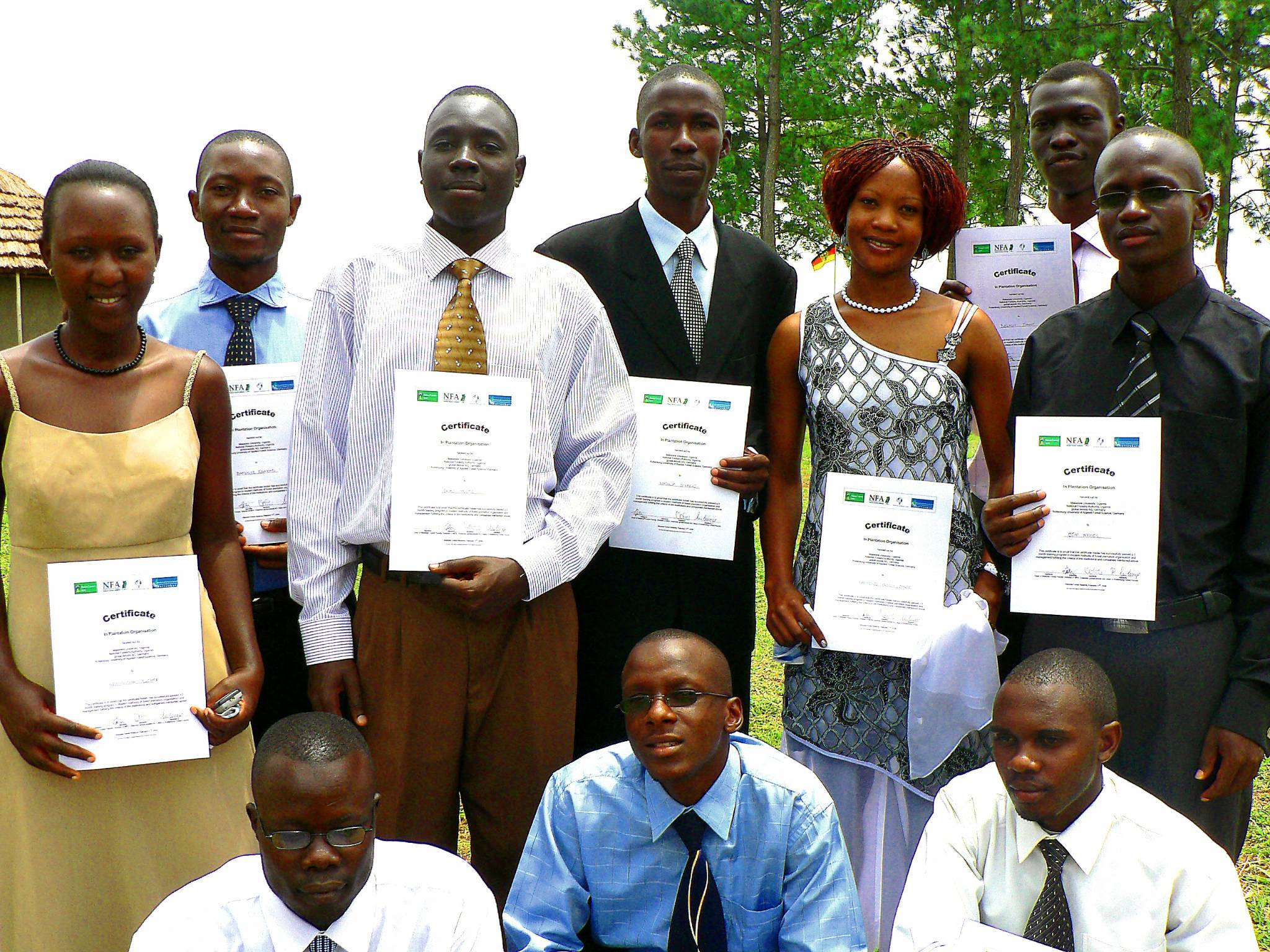 Employees receiving planting certificates